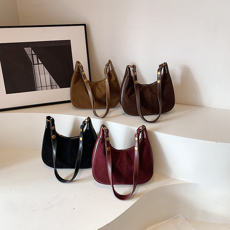 Einfarbige Umhängetasche mit Reißverschluss