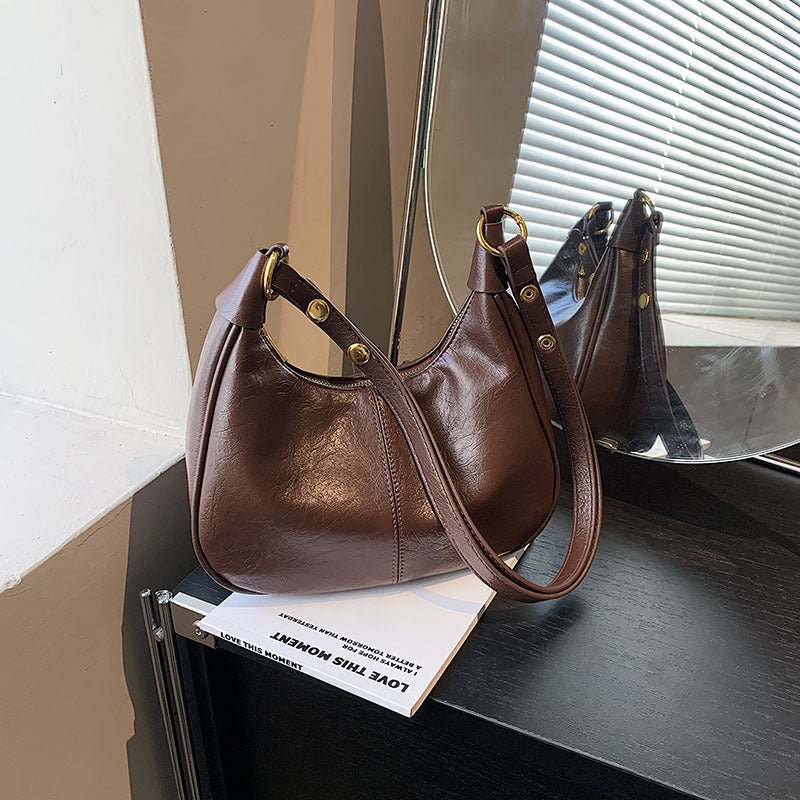 Einfarbige Umhängetasche mit Reißverschluss