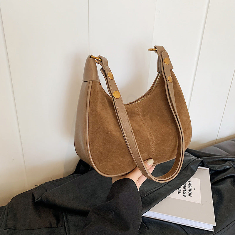 Einfarbige Umhängetasche mit Reißverschluss