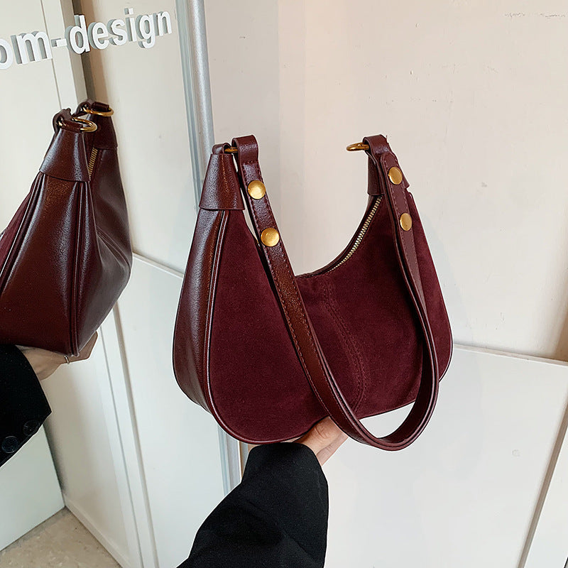 Einfarbige Umhängetasche mit Reißverschluss