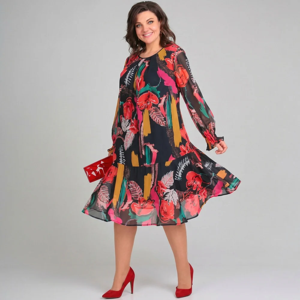 Kleid mit fließenden Ärmeln und lebendigem Print