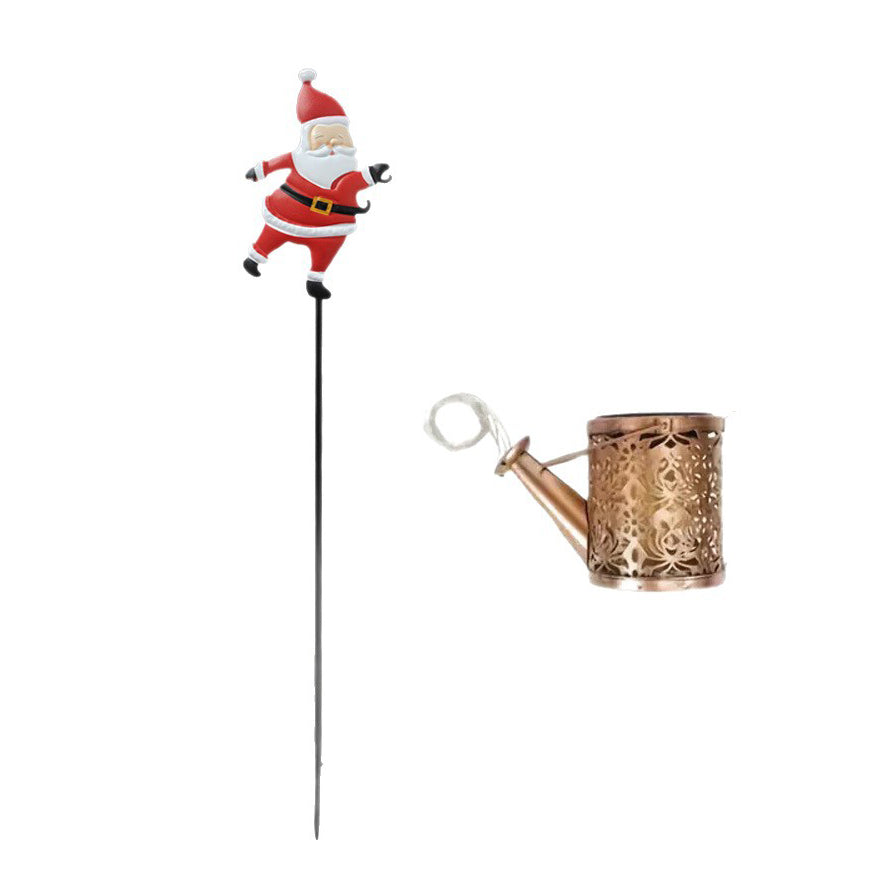 Solare-Laterne „Weihnachtsmann beim Gießen“